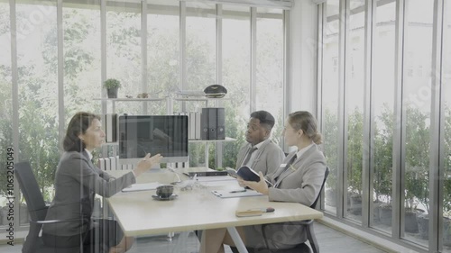 Airline staff are having a meeting in a modern conference room. Colleagues having meeting in boardroom, businessman giving speech.