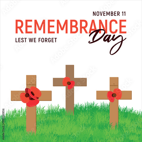 Wooden cross with red poppies stuck into a green lawn. Traditional decoration for Poppy Day in the UK on November 11. Remembrance Day for soldiers who died in World War I. A symbol of remembrance.