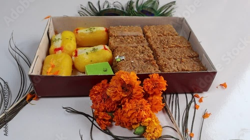 Cham cham and milkcake (kalakand), traditional Indian sweets, served together on a tray, perfect for festive celebrations and special occasions, adding sweetness to gatherings. Selective focus  photo