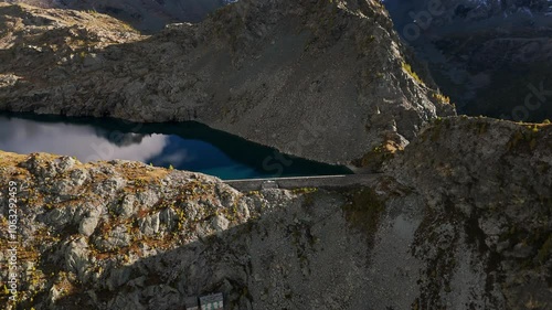 Aerial view of the Enel weir at Lago Pirola, nestled in the scenic landscape of Valmalenco, Lombardy photo