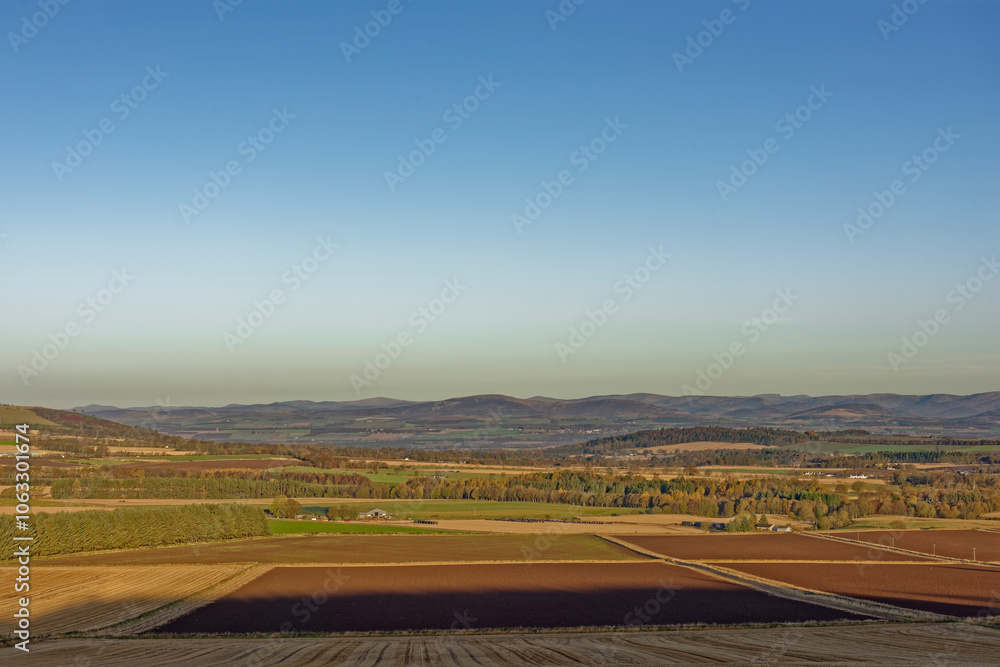 The view from Carrot Hill north over the Farmland of the Strathmore Valley and on to the Mountains of the Angus Glens. The view from Carrot Hill north over the Farmland of the Strathmore Valley and on to the Mountains of the Angus Glens.