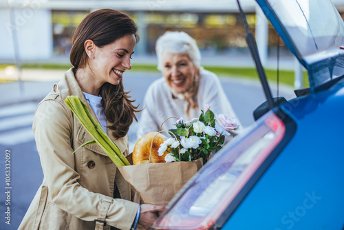 Happy Mother and Daughter Grocery Shopping Outdoors Together