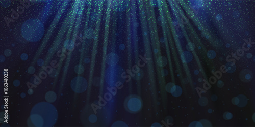 Rays of light underwater with glowing plankton, overlay effects and bokeh. Dark blue gradient background and photofluorescent particles and microorganisms.