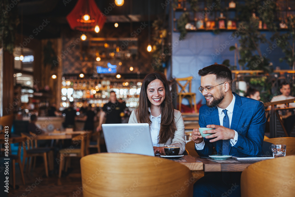 Two Professionals Networking Over Coffee in a Cozy Cafe Setting Two Professionals Networking Over Coffee in a Cozy Cafe Setting