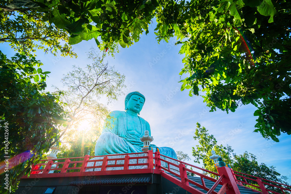 The Great Buddha Simulate (Daibutsu or Great Buddha of Kamakura) stucco Buddha statue at Wat Phra That Doi Phra Chan in the city of Mae Tha in Lampang North of Thailand, travel Unseen Thailand