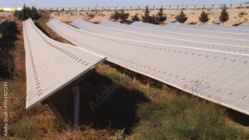 Solar panels from the side of the road . High quality photo