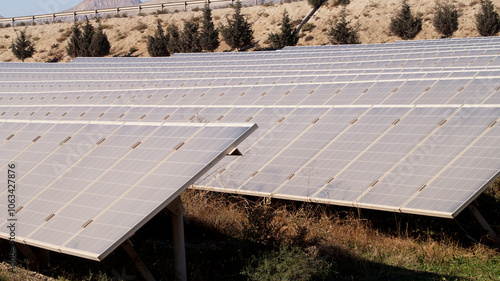 Solar panels from the side of the road . High quality photo