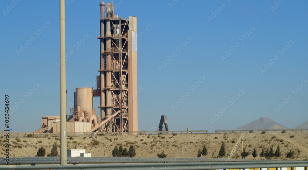 Cement factory on the side of the road . High quality photo Cement factory on the side of the road . High quality photo