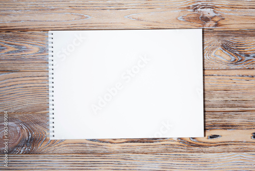 Spiral Notebook on Wooden Background
