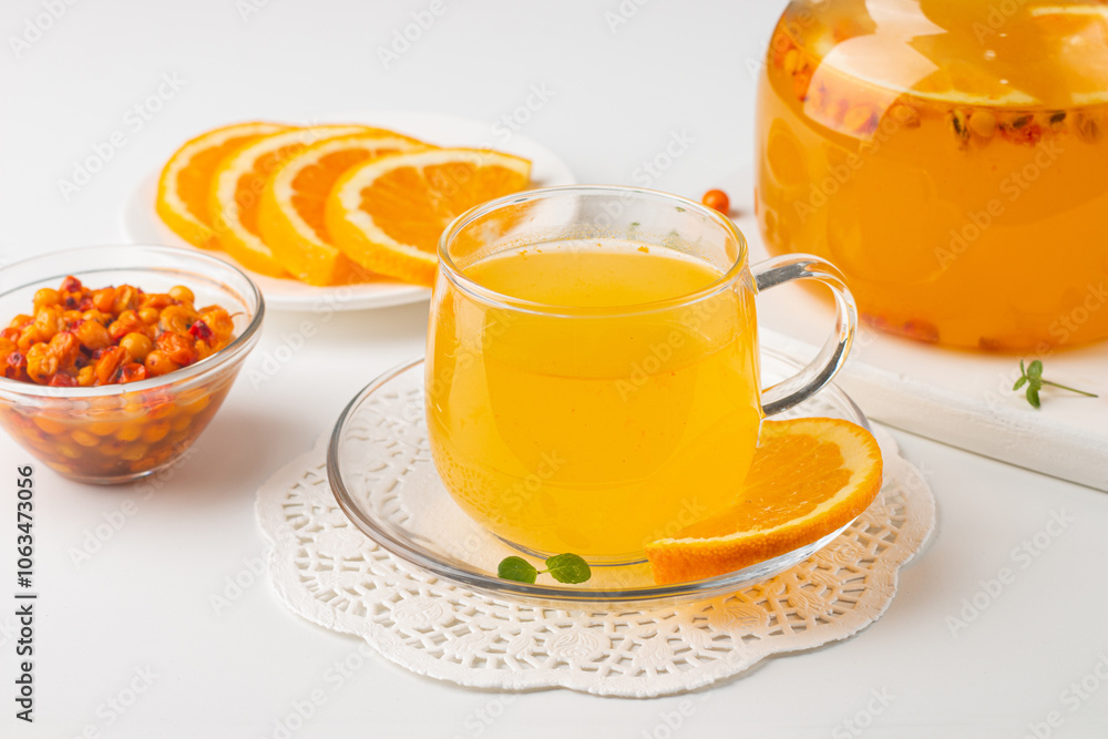 Sea buckthorn tea drink with oranges and mint. Autumn comfort hot drink. Herbal vitamin tea. Sea buckthorn tea drink with oranges and mint. Autumn comfort hot drink. Herbal vitamin tea.