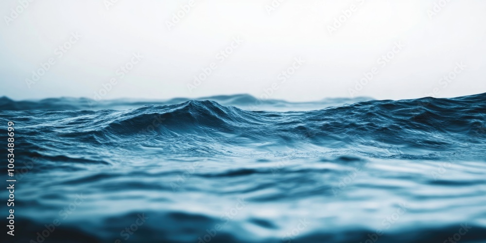 Fototapeta premium A detailed view of a choppy water surface featuring powerful waves. Perfect choice for nautical themes, oceanic imagery, or abstract backdrops.