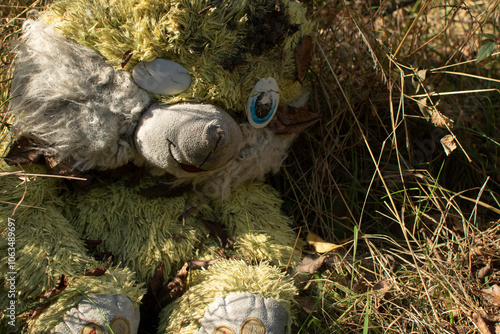 Old dirty plush rabbit toy	 photo