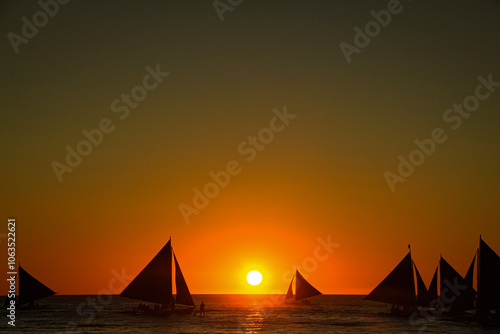 Boracay Beach in the Philippines is famous for its breathtaking sunsets. The sky transforms with vibrant colors as the sun dips below the horizon, creating a serene and picturesque view, perfect for e