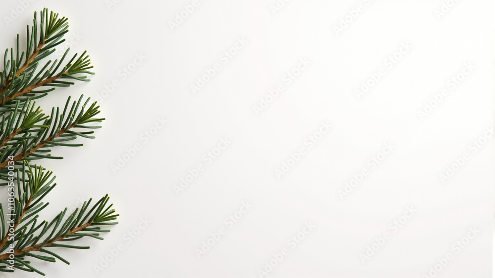 Holiday cards and pine sprigs on a clean minimal background Holiday cards and pine sprigs on a clean minimal background