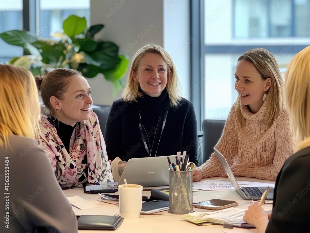 Modern office environment with a diverse team in a meeting, different ages and ethnic backgrounds Modern office environment with a diverse team in a meeting, different ages and ethnic backgrounds