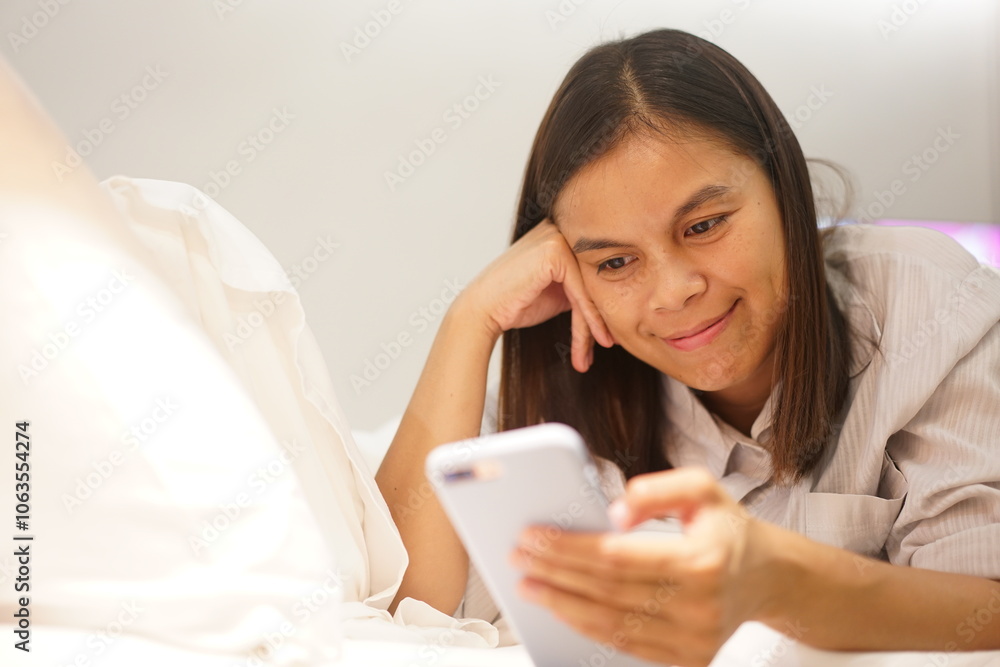 Beautiful happy young woman with mobile sitting and smiling, online dating concept. Beautiful happy young woman with mobile sitting and smiling, online dating concept.