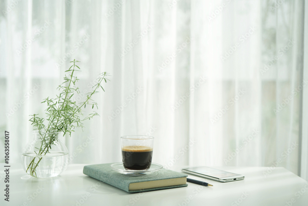 white coffee cup and plant pot on white table minimal interior white coffee cup and plant pot on white table minimal interior