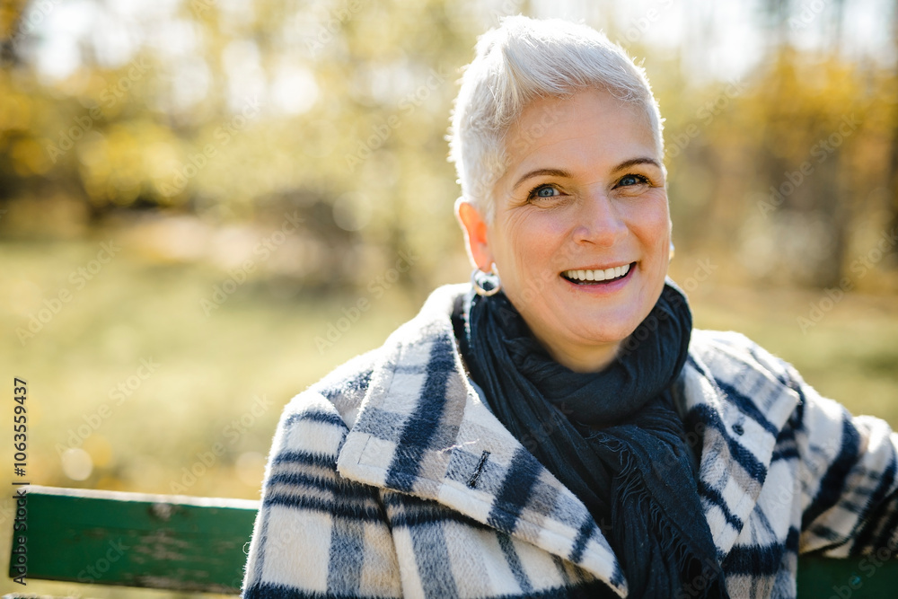 Mature woman in autumn forest, dressed in cozy fall attire, Reflection and connection with nature, wellness Mature woman in autumn forest, dressed in cozy fall attire, Reflection and connection with nature, wellness