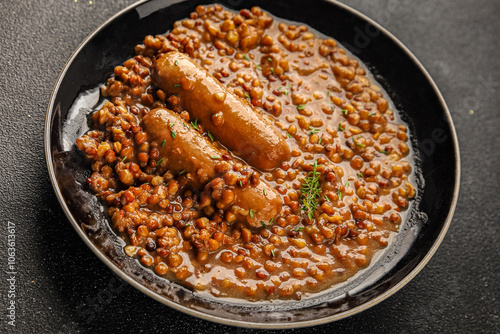 Lentil with sausages tasty food dish second course аresh delicious gourmet food background on the table rustic food top view copy space top view photo