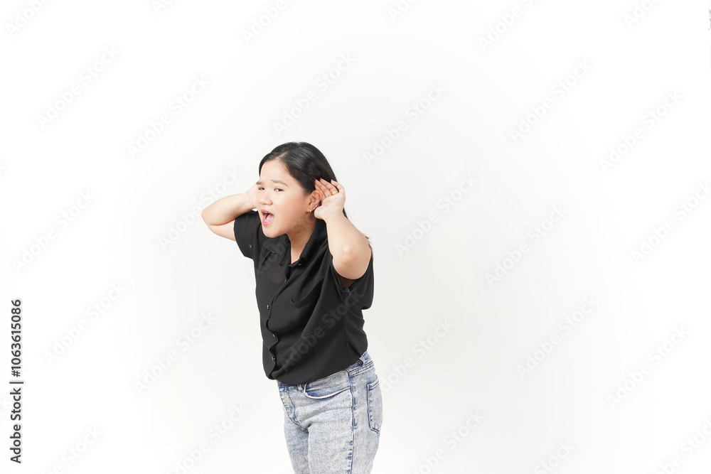 beautiful Asian woman poses with her hands on both ears, trying to listen attentively against a white background beautiful Asian woman poses with her hands on both ears, trying to listen attentively against a white background