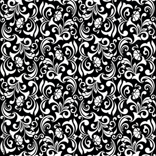 Flower pattern. Seamless white and black ornament. Graphic vector background. Ornament for fabric, wallpaper, packaging.