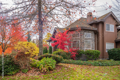 Fragment of luxury house in fall with green trees and nice landscape in Vancouver, Canada, North America. Day time on November 2024.