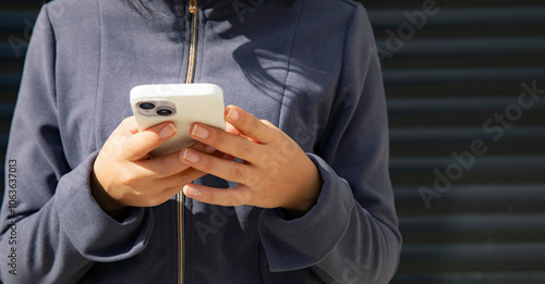 close up of woman hands holding smartphone. woman use phone