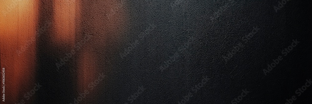 Dark Textured Surface with Orange Light Reflection Dark Textured Surface with Orange Light Reflection