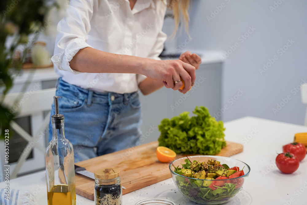 Cooking concept. Woman hands making healthy dinner, cutting vegetables on chopping board, kitchen interior, closeup