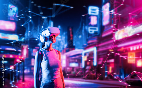 Smart female standing in cyberpunk style building in VRX wear VR headset connecting metaverse, future cyberspace community technology, Woman raising head looking virtual construction. Hallucination. photo