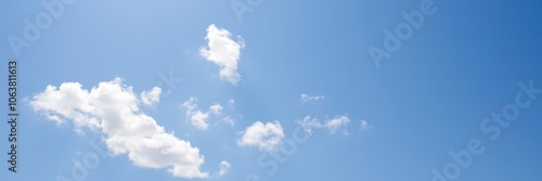 Clear blue sky with fluffy white clouds, perfect for a peaceful and serene backdrop, nature, clear