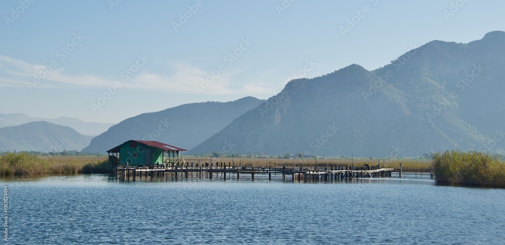Active fishing farm at Dalyan River with reed grasses in Turkey