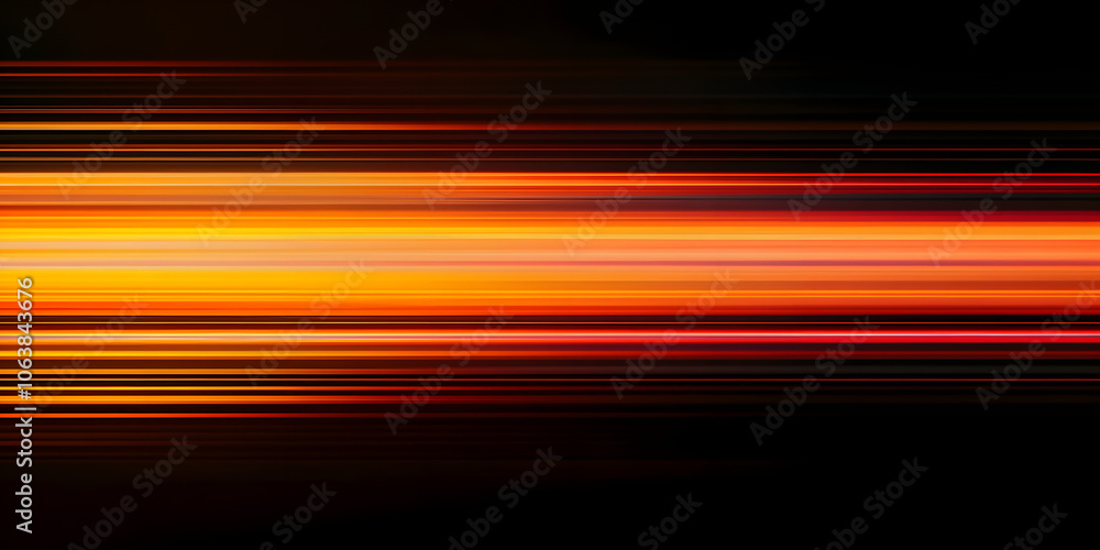 The effect of orange light in fast motion on a black background. blurred abstract background with long exposure. neon light