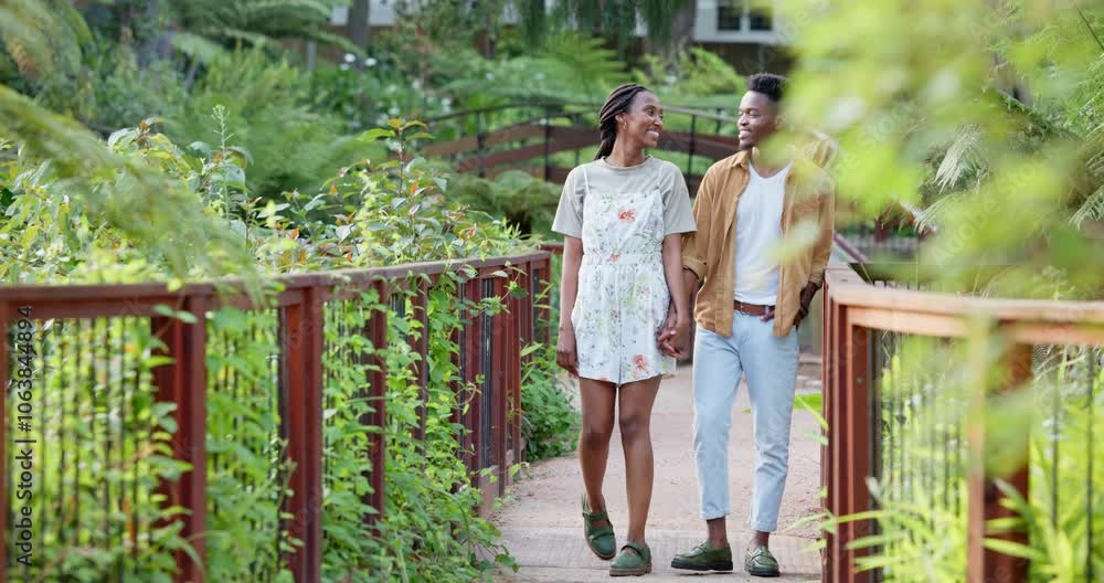 Smile, black couple and holding hands for walking outdoor with care, travel discussion and nature date. Happy, people and partner support with love, marriage commitment and bonding together at garden Smile, black couple and holding hands for walking outdoor with care, travel discussion and nature date. Happy, people and partner support with love, marriage commitment and bonding together at garden