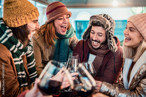 Photography Young people  toasting red wine dining at restaurant terrace - Happy friends gro