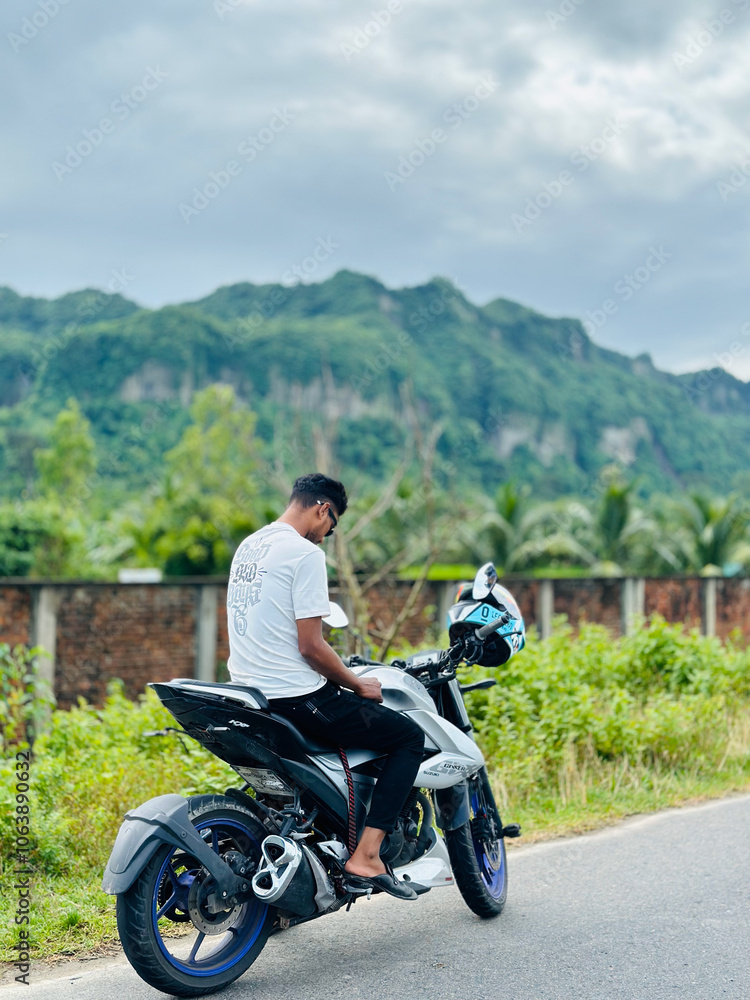 Obraz premium young man on a motorcycle