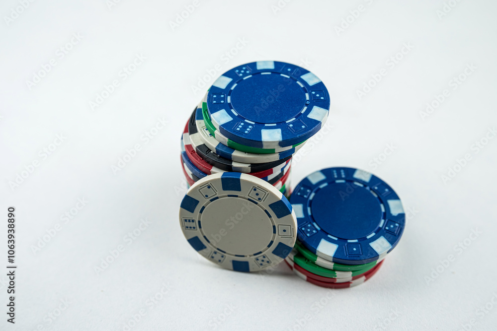 different color poker chips isolated on white gray background different color poker chips isolated on white gray background