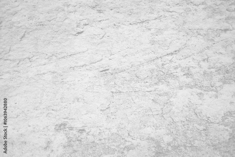 Naklejka premium Light grey bumpy stone wall for abstract background and texture for interior or exterior design. Beautiful patterns, space for work, banner, wallpaper close up.