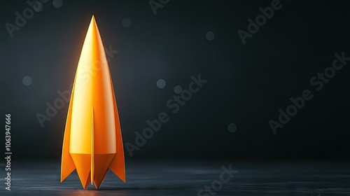 A delicate origami rocket stands poised on a dark, minimalistic backdrop, showcasing creativity and craftsmanship in a vibrant hue photo