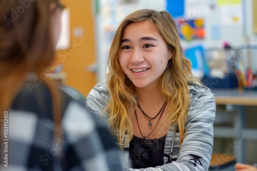 Student is talking with a school counselor about college