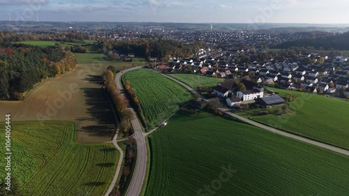 Fly over the Bavarian landscape during Autumn season 
