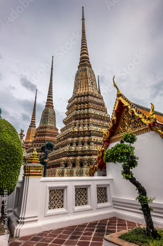 Stupa and the colorful roofs of the temple of Wat Pho in Bangkok