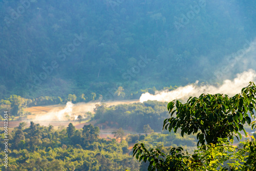 Mountain landscape with tropical jungle fields in Vang Vieng Laos. photo