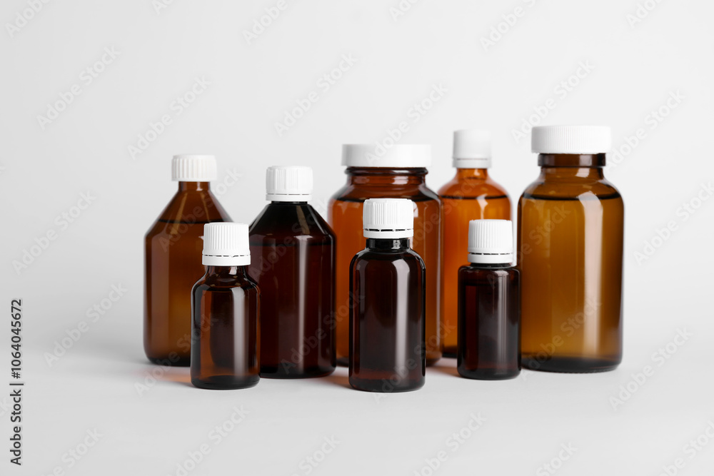 Medical bottles with medicine on white background Medical bottles with medicine on white background
