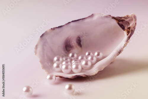 Beautiful white pearls on an oyster shell.