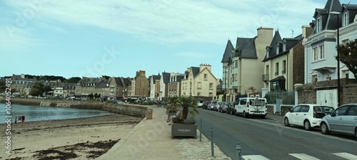 Saint-Malo: Charming Seaside Town with Traditional Architecture Along Beach Promenade photo