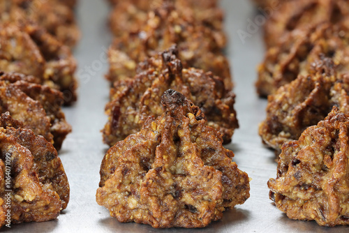 nut macaroons on aluminum baking tray