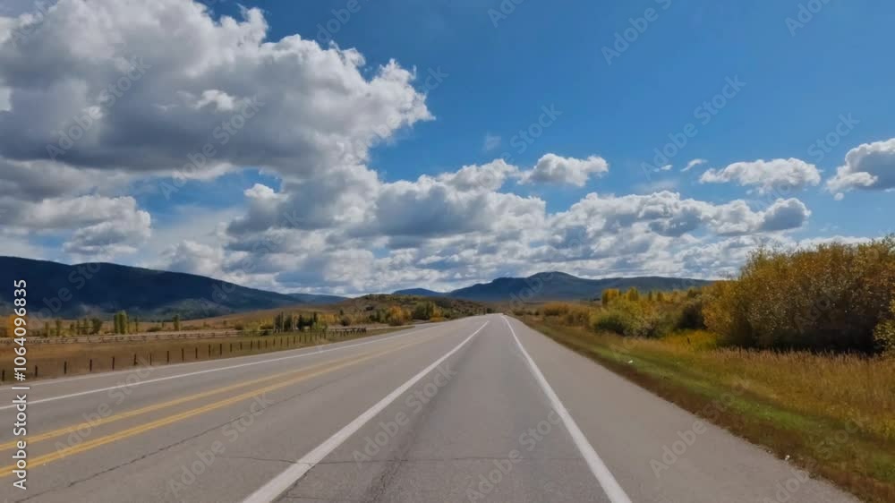 Immersive driver's point of view journey through mountains at peak fall foliage from Steamboat Springs to Yampa, Colorado. Immersive driver's point of view journey through mountains at peak fall foliage from Steamboat Springs to Yampa, Colorado.