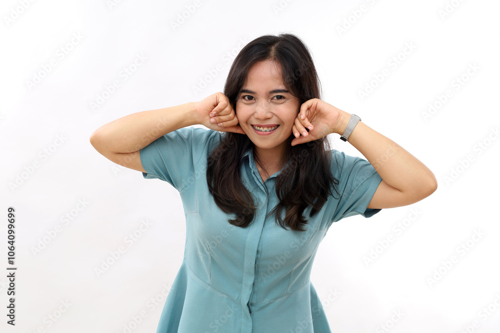 Positive young Asian woman smiles happily looking camera has cheerful expression dressed casual shirt keeps hands on cheeks isolated white background encourages you praises excellent choice Positive young Asian woman smiles happily looking camera has cheerful expression dressed casual shirt keeps hands on cheeks isolated white background encourages you praises excellent choice