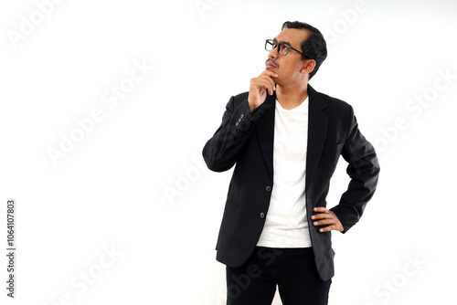 Thoughtful asian businessman standing thinking some ideas  Isolated on white with copyspace